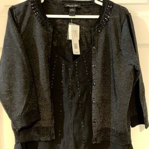 Black dressy sweater blouse.